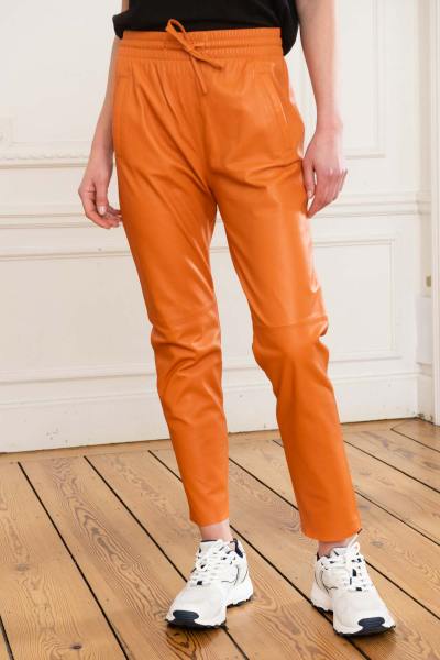 Pantalon en cuir orange femme