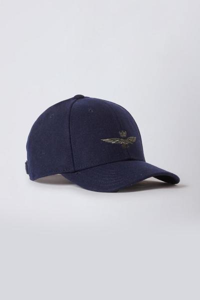 Gorra azul marino con bordado de águila