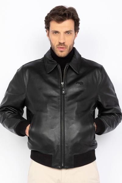 Blouson en cuir noir col chemise et bords côtelés